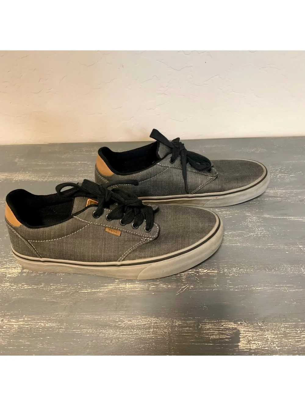 Gray low top lace-up sneakers